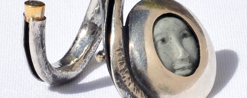 Anti-clastic raised ring - silver, gold, porcelain, aquamarine. Anti-clastic raised ring - silver, gold, porcelain, aquamarine.