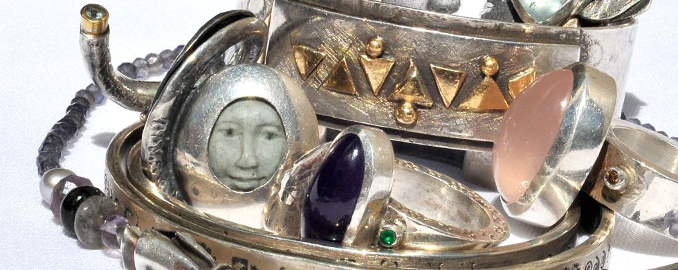 Composite of rings, bracelets and necklace. Composite of rings, bracelets and necklace.